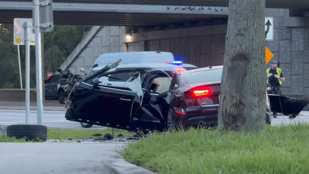 Port Orange police vehicles near the I-95 and Taylor Road crash investigation